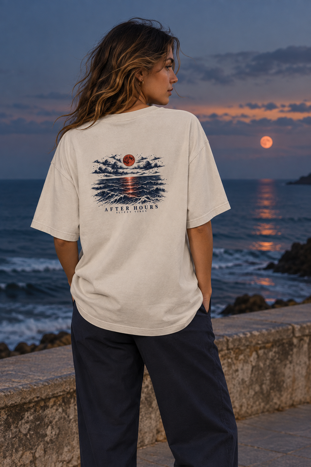 AI-created campaign image — After Hours campaign model in Faded Bone tee beside the ocean at dusk